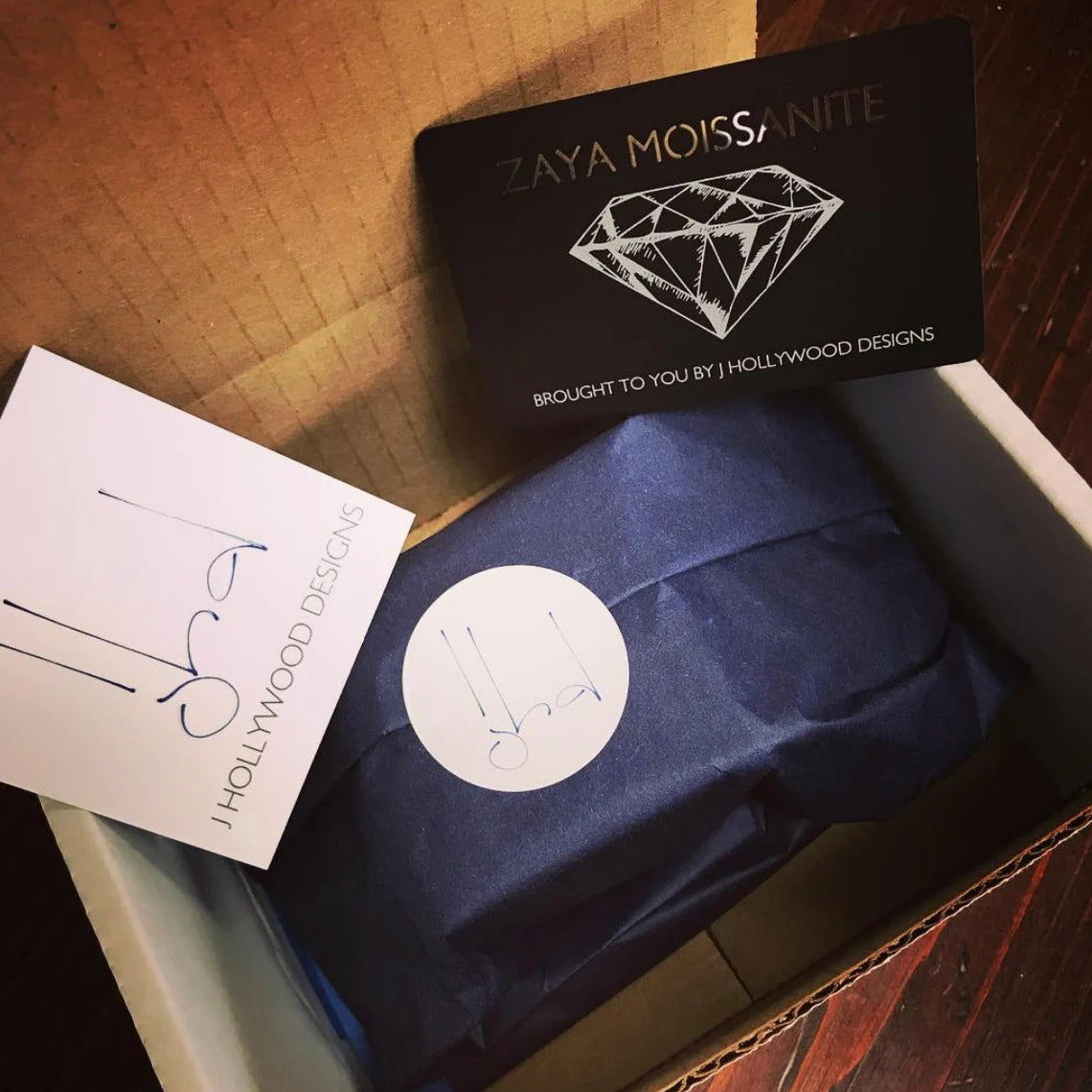 ring box in our gift packaging with warranty card and company logo - J Hollywood Designs