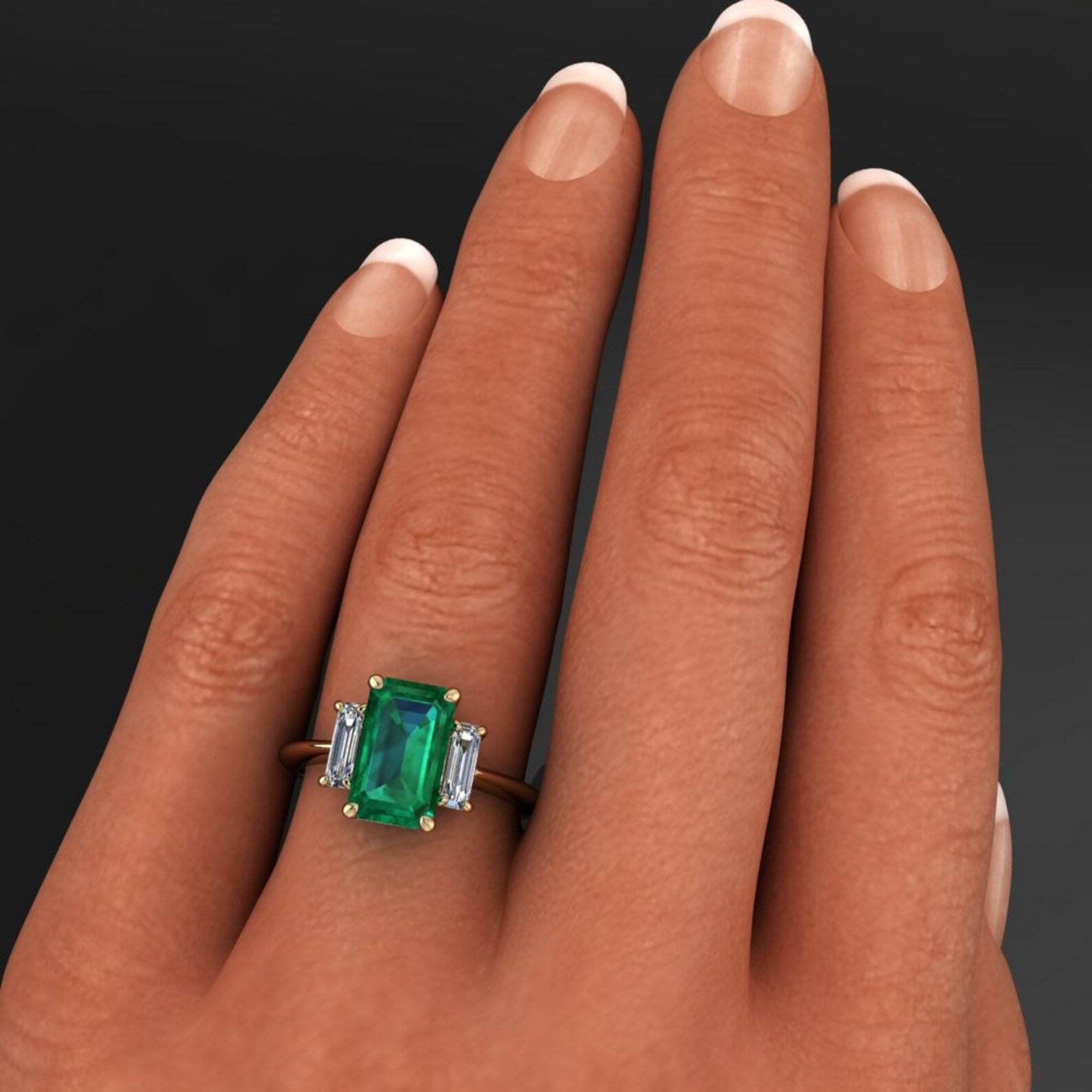 A Christie's employee models the Emerald and Diamond ring of 47.72 carats  by David Webb which is to be auctioned in Christie's Magnificent Jewels  sale in Geneva on the 15th November Stock