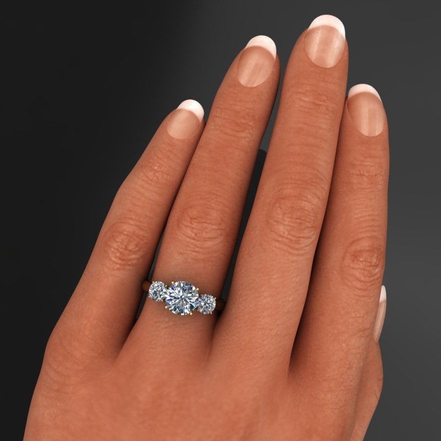 eden ring - 1.5 carat round NEO moissanite engagement ring, 3 stone anniversary band on hand model - J Hollywood Designs